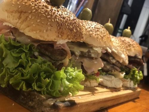 a large sandwich sitting on top of a table at Apartamentos PREMIUM CON YACUZZI DUNAS DEL ESTE in Punta Colorada
