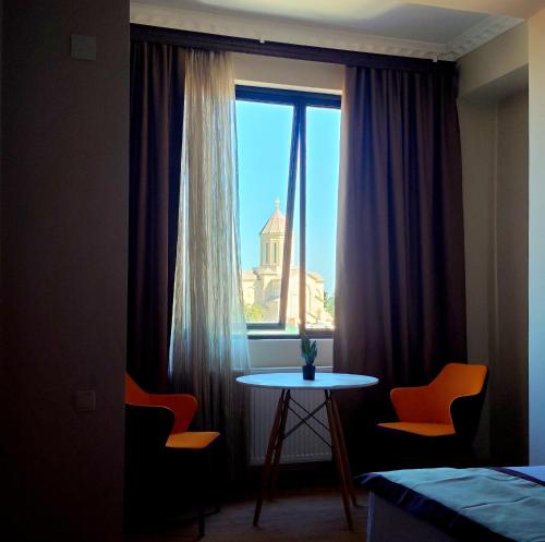 Postel nebo postele na pokoji v ubytování Hotel Red Tower