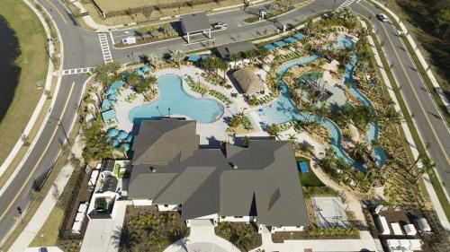 an aerial view of a pool at a resort at Storey lake 4BD/3BA BrandNew luxury pvt pool in Kissimmee