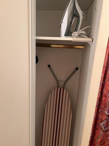 a closet with a woodenppelin at Champion suites in Sarcelles