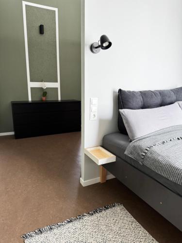 Katil atau katil-katil dalam bilik di Comfort Apartment - Bis 6 Schlafplätze mit 4 Betten