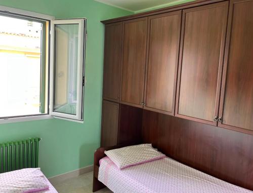 Ένα ή περισσότερα κρεβάτια σε δωμάτιο στο La CASA GIALLA