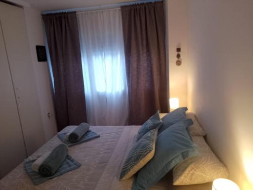 Katil atau katil-katil dalam bilik di Migjorn Apartment a place in the heart of Sitges
