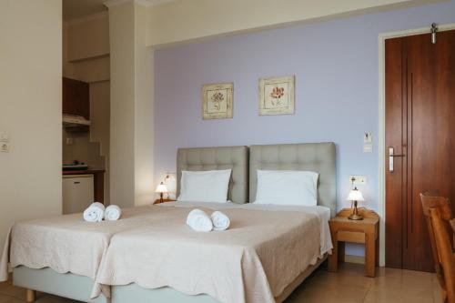 Posteľ alebo postele v izbe v ubytovaní Hotel Livikon