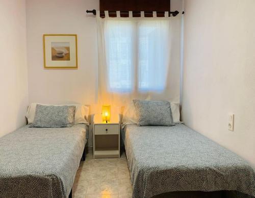 Apartamento con piscina a 200m de la playa en Denia
