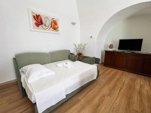 Postel nebo postele na pokoji v ubytování Casa Al Muretto