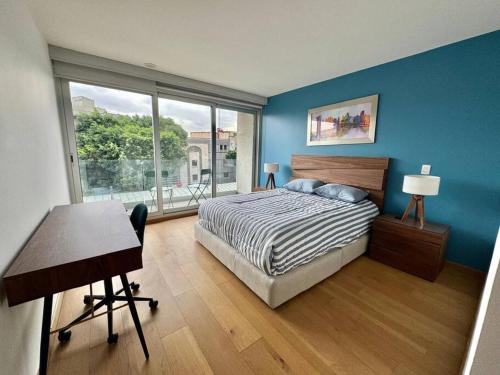 Ένα ή περισσότερα κρεβάτια σε δωμάτιο στο Mili & Mila Depto con Alberca y Gym en el corazón de Condesa y Roma