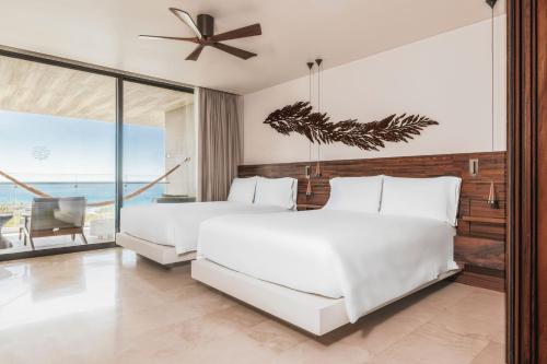 Postel nebo postele na pokoji v ubytování Solaz, a Luxury Collection Resort, Los Cabos