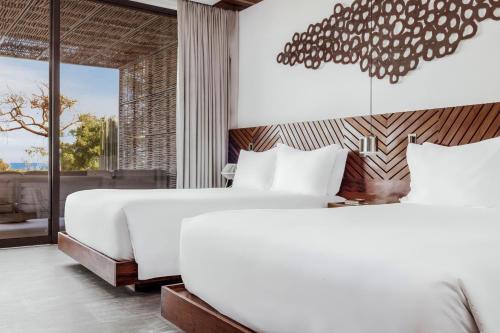 Postel nebo postele na pokoji v ubytování Solaz, a Luxury Collection Resort, Los Cabos