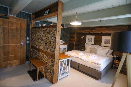Postel nebo postele na pokoji v ubytování Hotel Bouda Helena