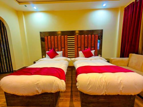 Kabirs Hotel Kalamにあるベッド