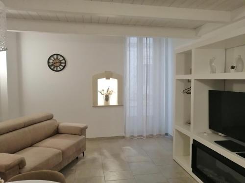 Télévision ou salle de divertissement dans l'établissement La Terrazza Del Corso