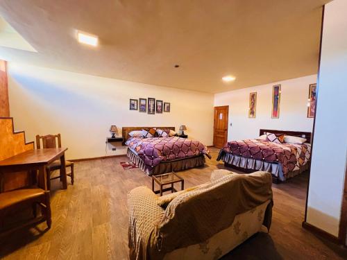 Hotel Gran Aurumにあるベッド