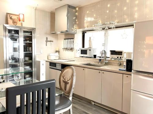 Dapur atau dapur kecil di Okinawa 住宅風ゲストルームM's house