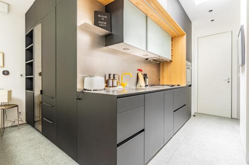 Kuchyň nebo kuchyňský kout v ubytování Hip Studio Central Bellevue