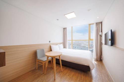 Cama o camas de una habitación en Kenny Stay Jeju Seogwipo