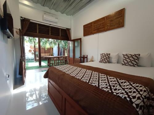 Katil atau katil-katil dalam bilik di GriyaArimba 2 Homestay