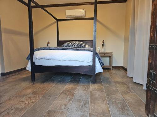 Letto o letti in una camera di Ugab Game Farm & Lodge