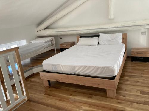 Posteľ alebo postele v izbe v ubytovaní La Casa di Anna