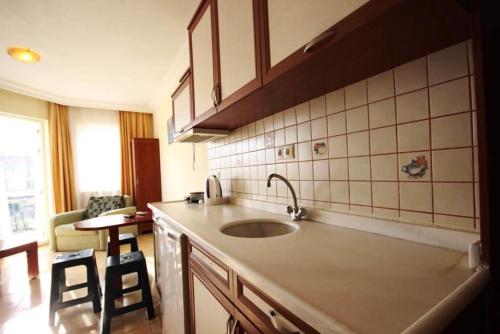 Kuchyň nebo kuchyňský kout v ubytování Minta Apart Hotel
