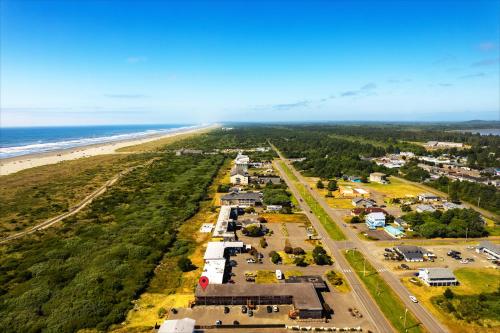an aerial view of a beach and the ocean at High Dunes Condos in Ocean Shores
