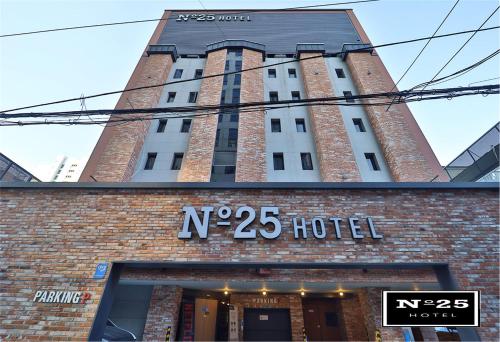 a building with a sign that reads n hotel at No25 Hotel Suyu in Seoul