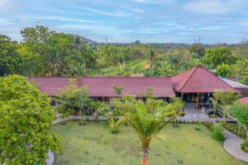 an aerial view of a house with a garden at Taman Bidadari Eco Wellness in Pemuteran