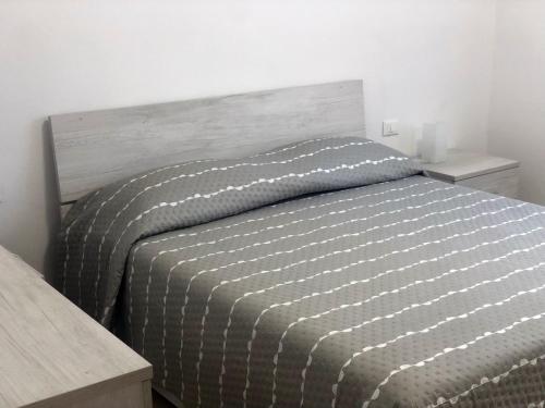 Postel nebo postele na pokoji v ubytování Garden House Cristina La Spezia 5 terre