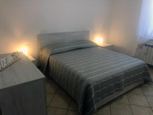 Postel nebo postele na pokoji v ubytování Garden House Cristina La Spezia 5 terre