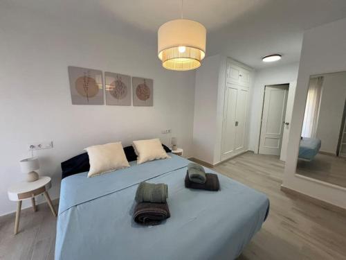 Postel nebo postele na pokoji v ubytování Elegante y luminoso apartamento de playa