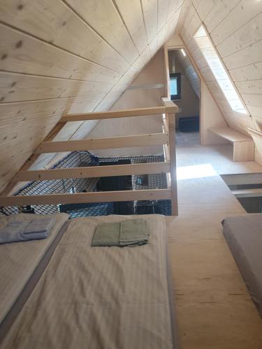 Postel nebo postele na pokoji v ubytování Chatka Katka