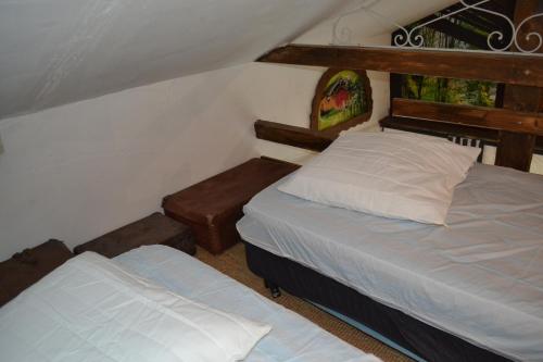 Katil atau katil-katil dalam bilik di Escape gîte de 4-6-8 pers avec jacuzzi entre Anduze et Alès