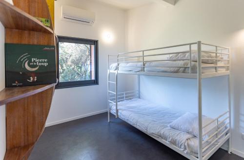 Letto o letti in una camera di Villa Hippocampe