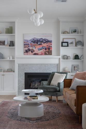 a living room with a couch and a coffee table at Field Street Cottages - 2 Bedroom House - Centrally Located Luxury in McLaren Vale