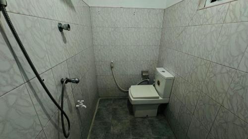 Un baño de The Village Home