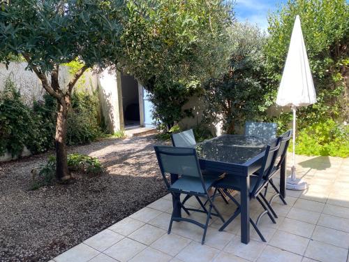 Κήπος έξω από το Maison lumineuse, de plain-pied, avec jardin clos - A 5mn de la plage