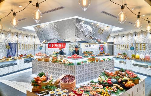 a grocery store filled with lots of fruits and vegetables at OMO5 Hakodate by Hoshino Resorts in Hakodate