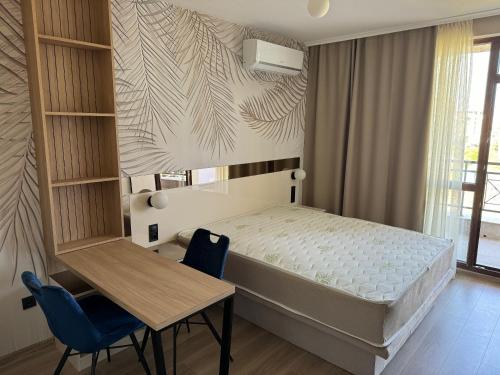 Giường trong phòng chung tại Sorrento Sole Mare Studio Appartment