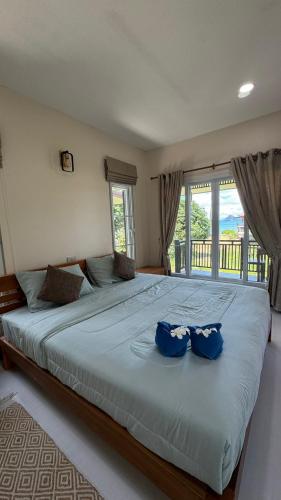 Ένα ή περισσότερα κρεβάτια σε δωμάτιο στο Picha house Kohyaonoi