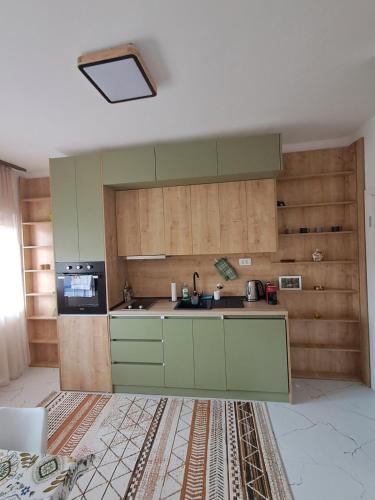 Una cocina o zona de cocina en HOME POINT Apartment