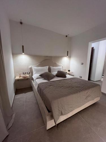 Ένα ή περισσότερα κρεβάτια σε δωμάτιο στο Casa Vacanza Ada
