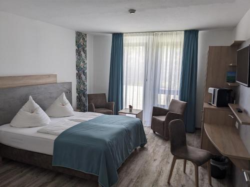 Postel nebo postele na pokoji v ubytování Gästehaus Zabeltitz
