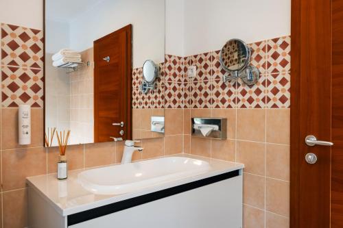 Koupelna v ubytování Hotel Lovec