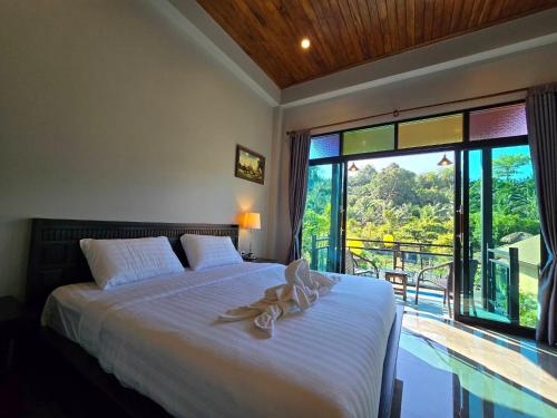 Letto o letti in una camera di Baan villa 1 bedroom in Klonghang