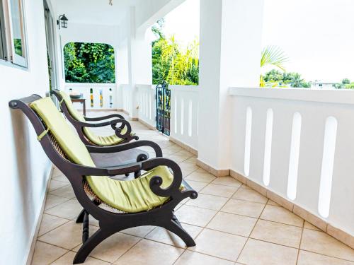 Balkón nebo terasa v ubytování Bottle Palm Villa
