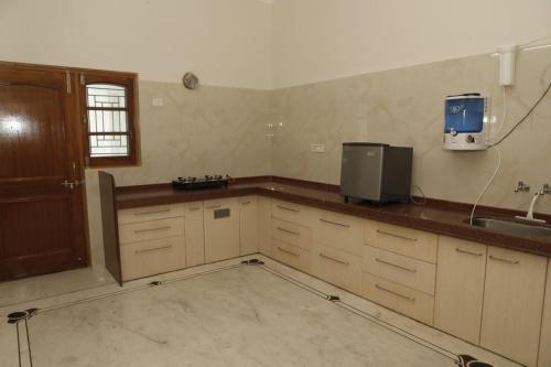 TV a/nebo společenská místnost v ubytování Medhya Boutique Homestay
