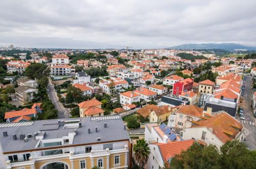 an aerial view of a city with buildings at Ocean Blue Apartment & Studio in Monte Estoril