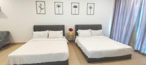 Ένα ή περισσότερα κρεβάτια σε δωμάτιο στο LCP T1 Honeymoon genting highland midhill homestay