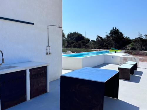 Πισίνα στο ή κοντά στο Aeneas Villa Pool & Jacuzzi al mare Torre Guaceto