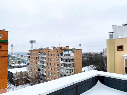 a view from the roof of a building at ApartPoltava НОВА ексклюзивна мансарда з виходом на дах в ЦЕНТРІ міста in Poltava